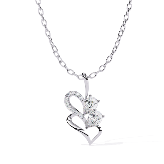 Open heart pendant designed with a smooth outline, containing two pear-cut stones and a line of closely set accent stones
