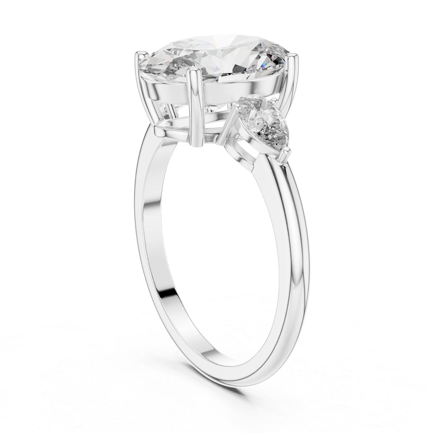 Pear Cut Diamond Ring with Oval Side Stones | Grace Meets Glamour