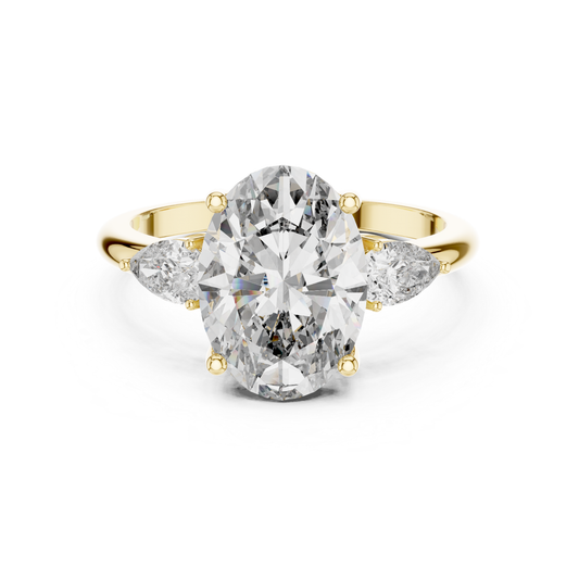 Pear Cut Diamond Ring with Oval Side Stones | Grace Meets Glamour