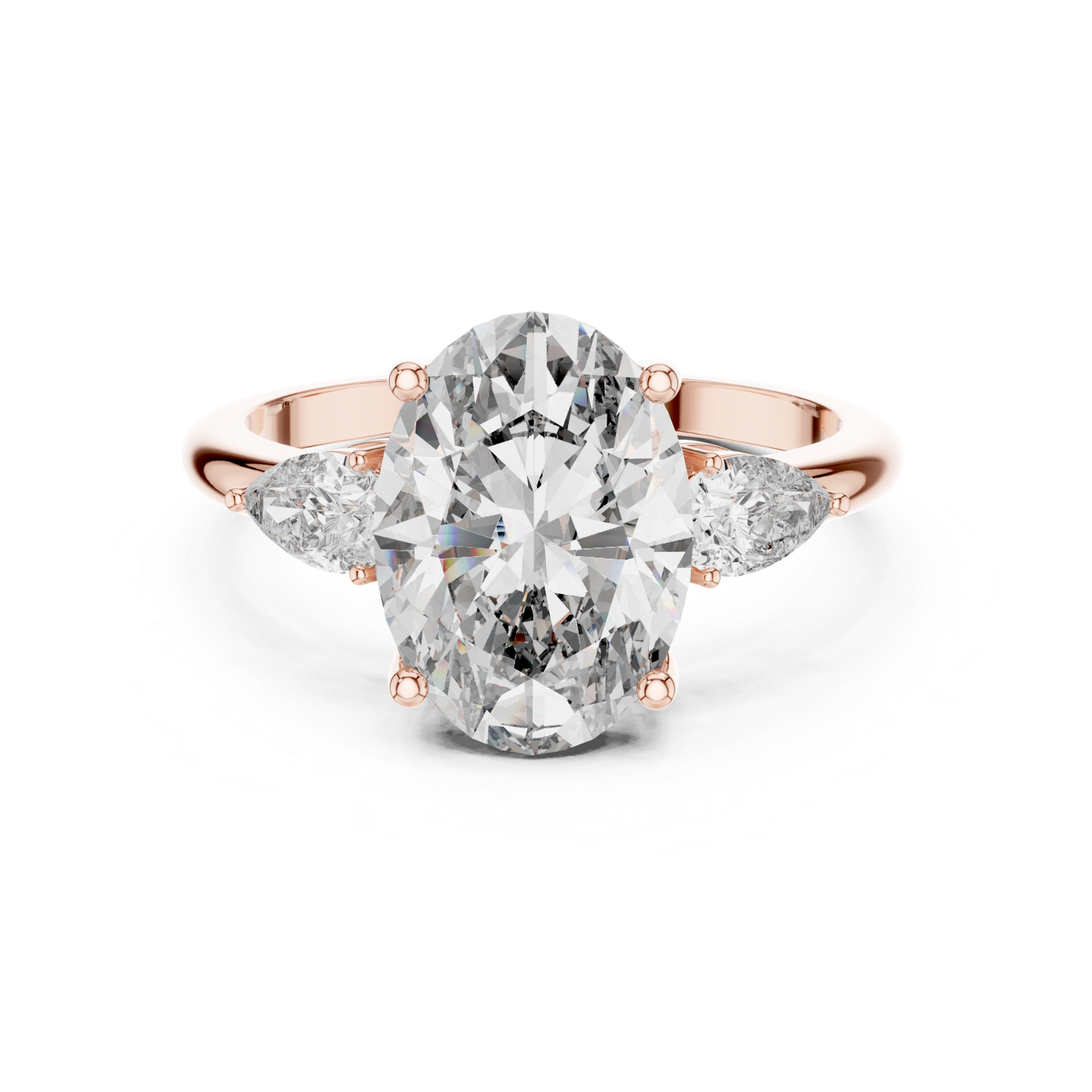 Pear Cut Diamond Ring with Oval Side Stones | Grace Meets Glamour