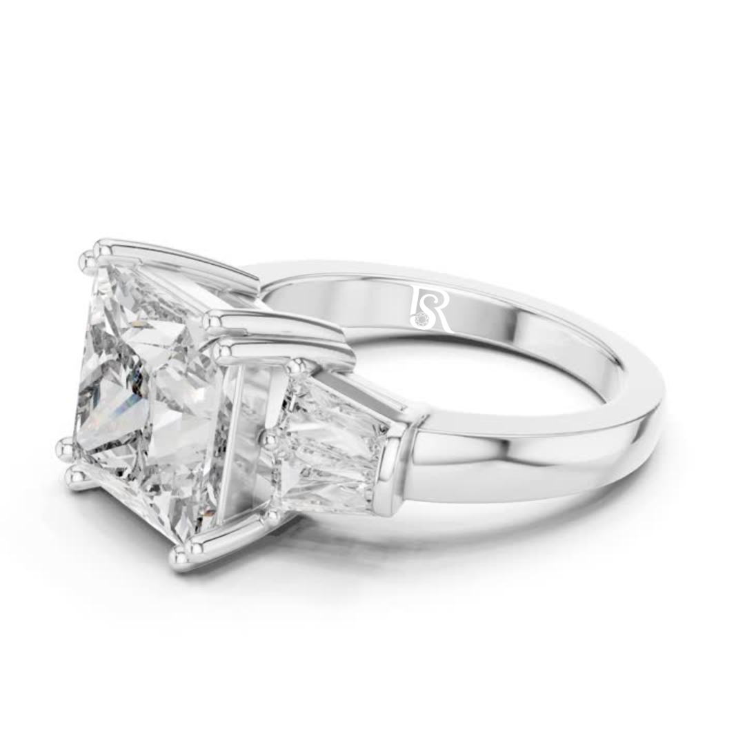 Elongated diamond three stone ring
Elongated diamond engagement ring
Three stone elongated diamond ring
Elongated center diamond ring
Diamond ring with elongated center
Elongated diamond bridal ring
Classic elongated diamond ring
Fine elongated diamond ring
Elongated diamond side stone ring
Elegant elongated diamond ring