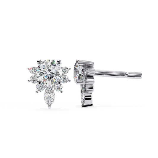 Sleek white-gold stud earrings featuring a dazzling diamond arrangement, creating a frosty, elegant look.