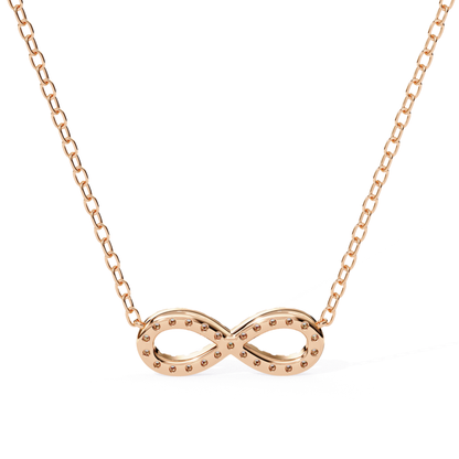 Rose gold infinity necklace on a white background