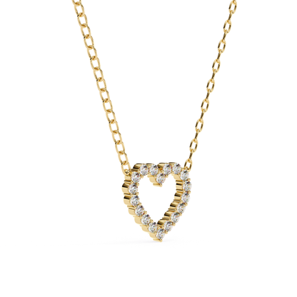 Heart-shaped diamond pendant necklace in gold with a striated design and diamonds outlining the heart.