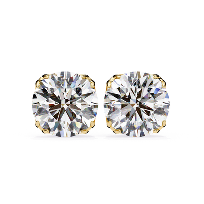 Pair of diamond stud earrings on a white background