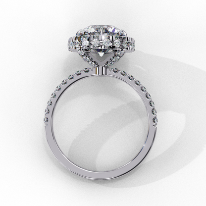 Round diamond in halo with pave band
Diamond center in halo with pave detailing
Halo ring with pave accents
Round diamond halo with pave band
Diamond halo with pave sides
Halo ring with pave diamonds
Round diamond in pave halo setting
Diamond halo with pave band
Halo engagement ring with pave accents
Round diamond set in pave halo