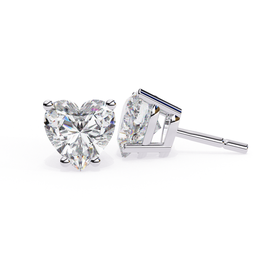 Heart shaped diamond stud earrings in white gold with prong setting