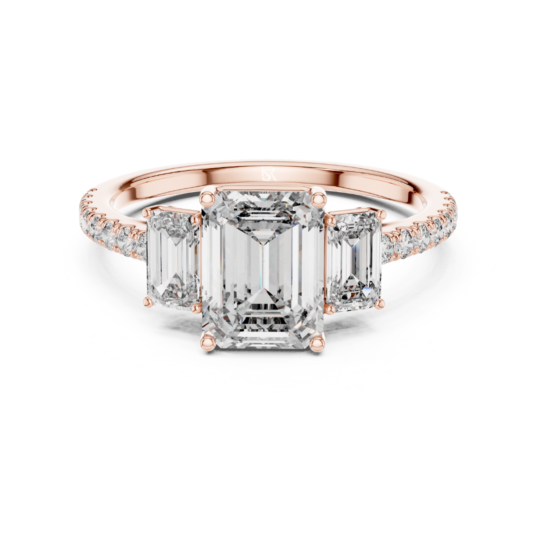 Emerald cut three stone diamond ring in rose gold
Rose gold emerald diamond engagement ring with side stones
Emerald cut diamond ring with pave band in rose gold
Three stone emerald diamond ring front view
Rose gold ring with emerald cut center diamond
Emerald cut lab diamond ring with tapered side stones
Minimal rose gold emerald diamond engagement ring
Pave band emerald cut three stone ring
Classic emerald cut diamond ring in rose gold
Rose gold three stone ring with emerald diamonds