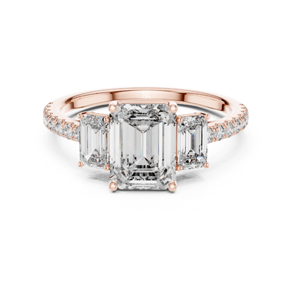 Emerald cut three stone diamond ring in rose gold
Rose gold emerald diamond engagement ring with side stones
Emerald cut diamond ring with pave band in rose gold
Three stone emerald diamond ring front view
Rose gold ring with emerald cut center diamond
Emerald cut lab diamond ring with tapered side stones
Minimal rose gold emerald diamond engagement ring
Pave band emerald cut three stone ring
Classic emerald cut diamond ring in rose gold
Rose gold three stone ring with emerald diamonds