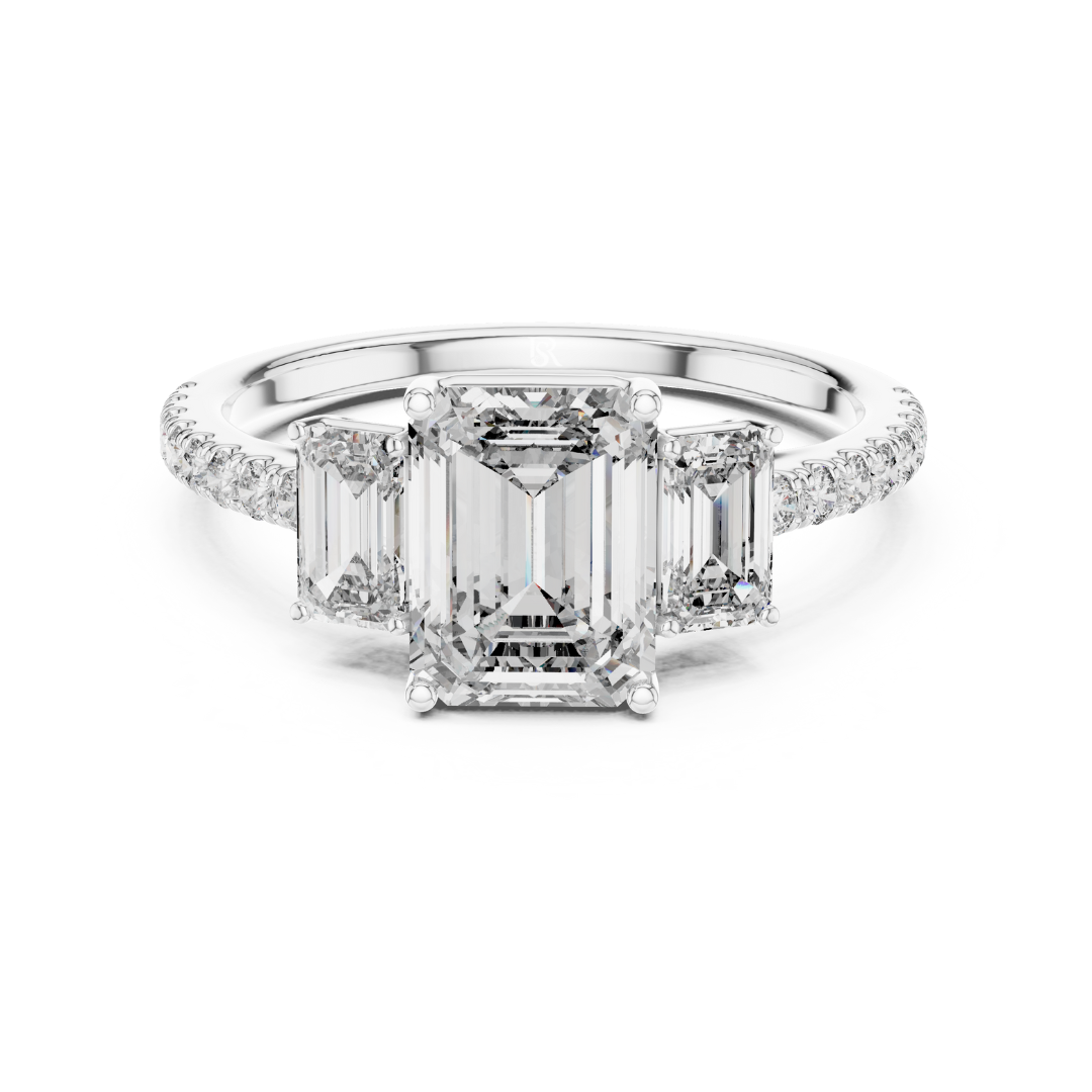 Emerald cut three stone diamond ring in white gold
White gold emerald diamond engagement ring with side stones
Emerald cut diamond ring with pave band in white gold
Three stone emerald diamond ring front view
White gold ring with emerald cut center diamond
Emerald cut lab diamond ring with tapered side stones
Minimal white gold emerald diamond engagement ring
Pave band emerald cut three stone ring
Classic emerald cut diamond ring in white gold
White gold three stone ring with emerald diamonds