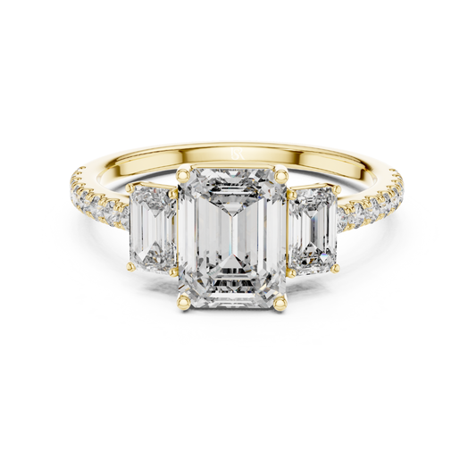 Emerald cut three stone diamond ring in yellow gold
Yellow gold emerald diamond engagement ring with side stones
Emerald cut diamond ring with pave band in yellow gold
Three stone emerald diamond ring front view
Yellow gold ring with emerald cut center diamond
Emerald cut lab diamond ring with tapered side stones
Minimal yellow gold emerald diamond engagement ring
Pave band emerald cut three stone ring
Classic emerald cut diamond ring in yellow gold
Yellow gold three stone ring with emerald diamonds
