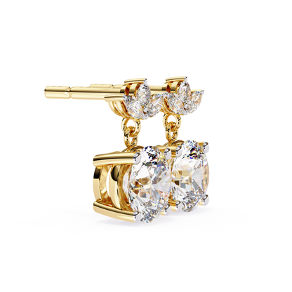  Elegant double diamond earrings with floral accents in yellow gold, featuring pear-shaped diamonds.