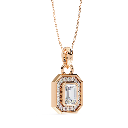 Rose gold necklace with an emerald cut diamond surrounded by smaller diamonds.