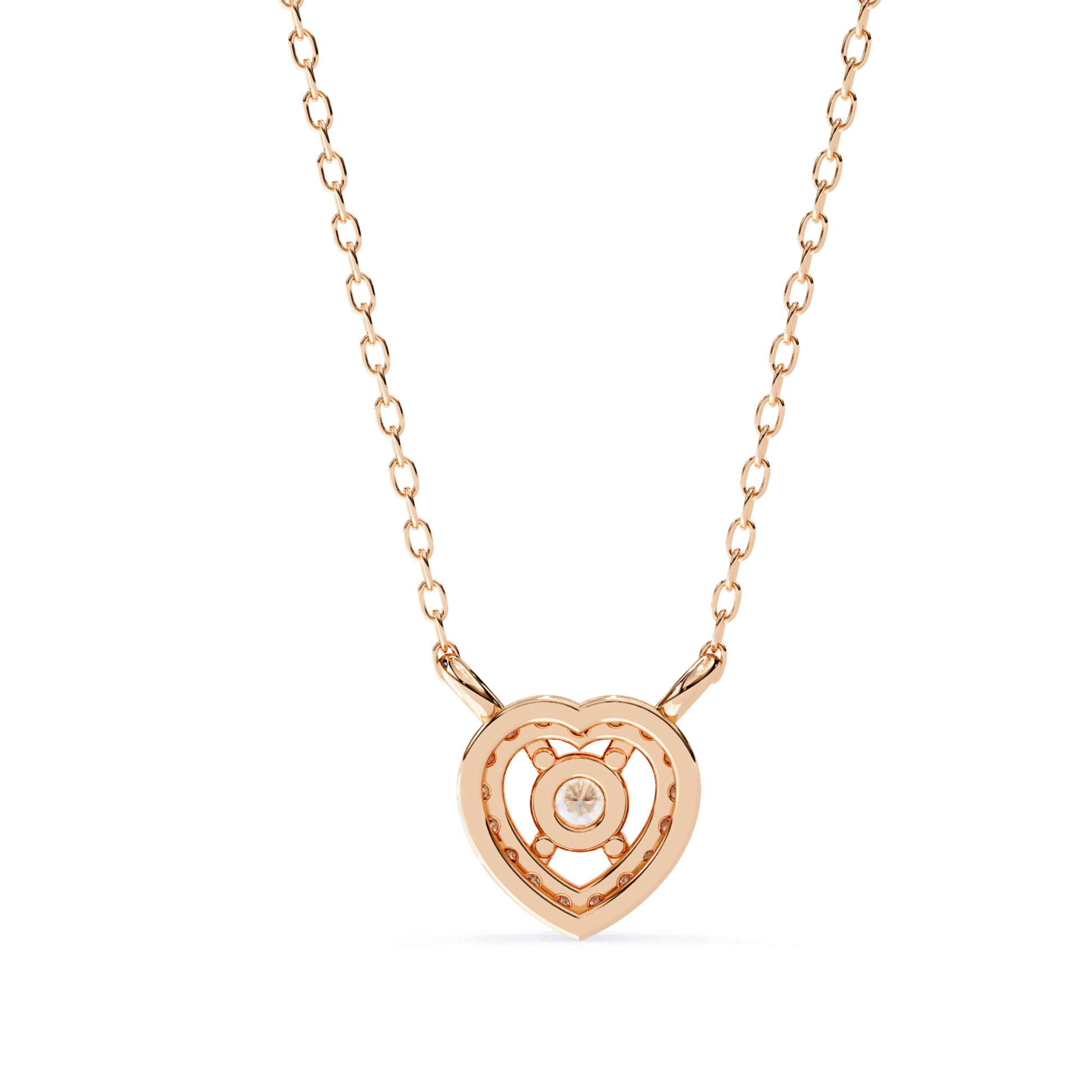 Reverse side of a rose gold necklace heart pendant with a simple mounting structure visible.