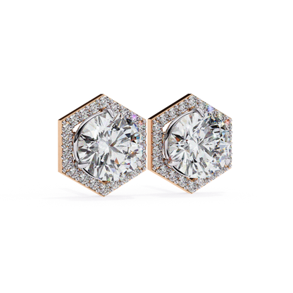 Elegant rose gold hexagonal earrings featuring a large round-cut diamond at the center, framed by a sparkling halo of smaller diamonds for a chic, sophisticated look.