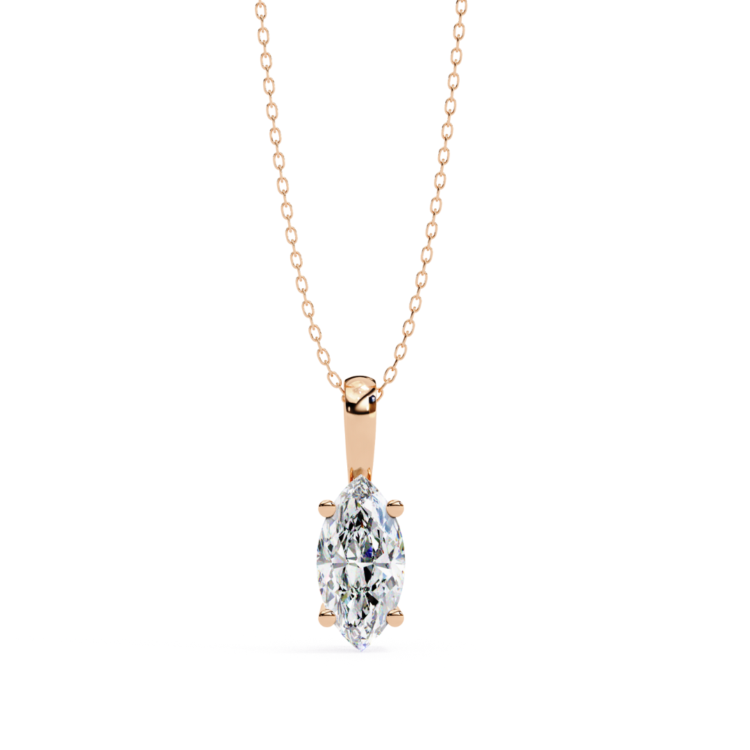 pendant with a pear-shaped diamond on a delicate gold chain.
