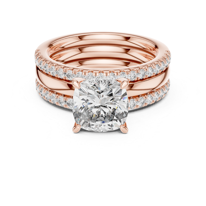 Rose gold cushion cut diamond bridal ring set
Cushion cut diamond engagement ring set
Rose gold diamond wedding ring stack
Cushion solitaire ring with diamond bands
Rose gold bridal set with round diamonds
Luxury cushion cut diamond ring set
Diamond engagement ring with matching bands
Rose gold cushion diamond wedding set
Elegant bridal ring stack with Pave diamonds
Cushion cut solitaire diamond ring in rose gold