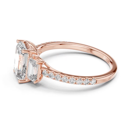 Side view of emerald cut three stone diamond ring in rose gold
Rose gold emerald diamond ring with pave band side view
Emerald cut diamond engagement ring side profile
Three stone emerald diamond ring in rose gold side angle
Rose gold ring with emerald cut diamonds side view
Emerald cut lab diamond ring with pave band profile
Minimal rose gold emerald diamond ring side view
Side profile of three stone diamond ring with pave band
Classic emerald cut engagement ring in rose gold side view
Rose gold pave band 