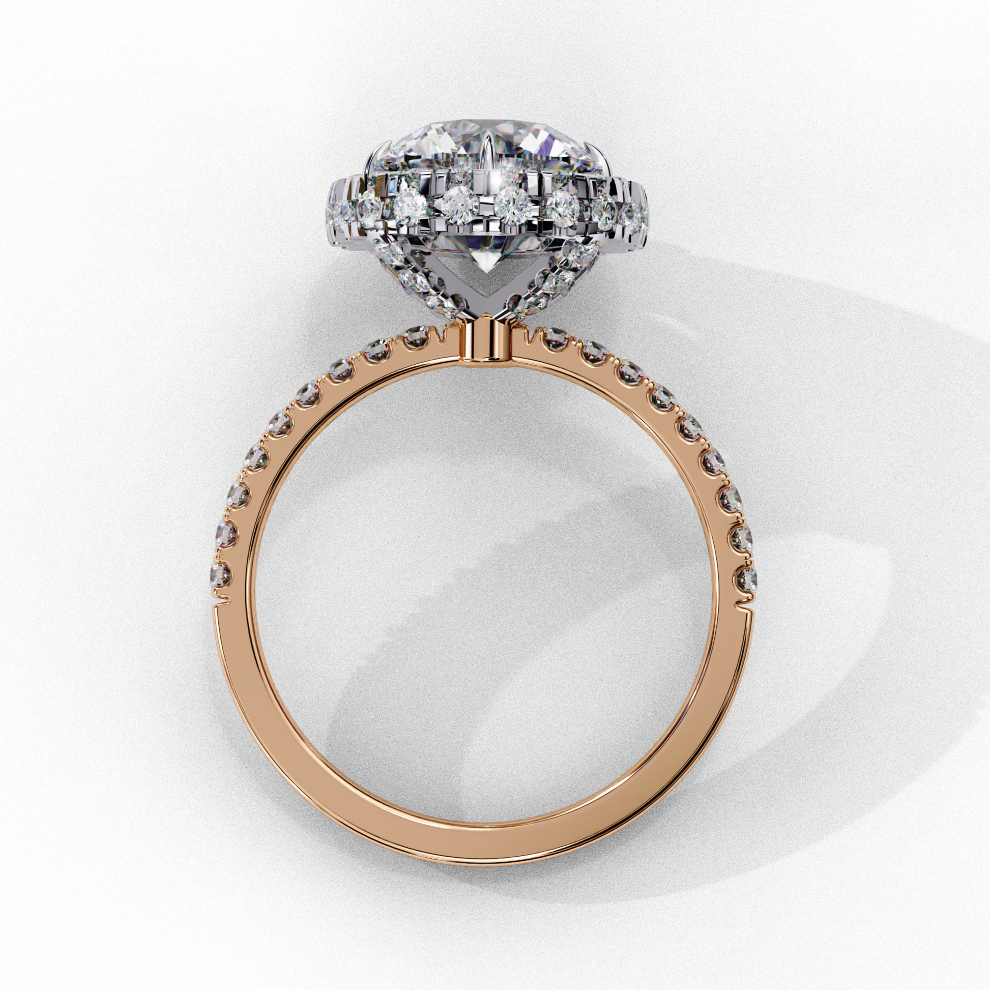 Round diamond in rose gold halo setting
Halo ring with pave diamonds in rose gold
Diamond center stone with pave accents
Rose gold halo ring with side diamonds
Round diamond with pave band in rose gold
Halo ring with diamond accents in rose gold
Diamond halo engagement ring with pave band
Rose gold band with round diamond in halo
Pave band with diamond halo ring
Halo engagement ring with round diamond