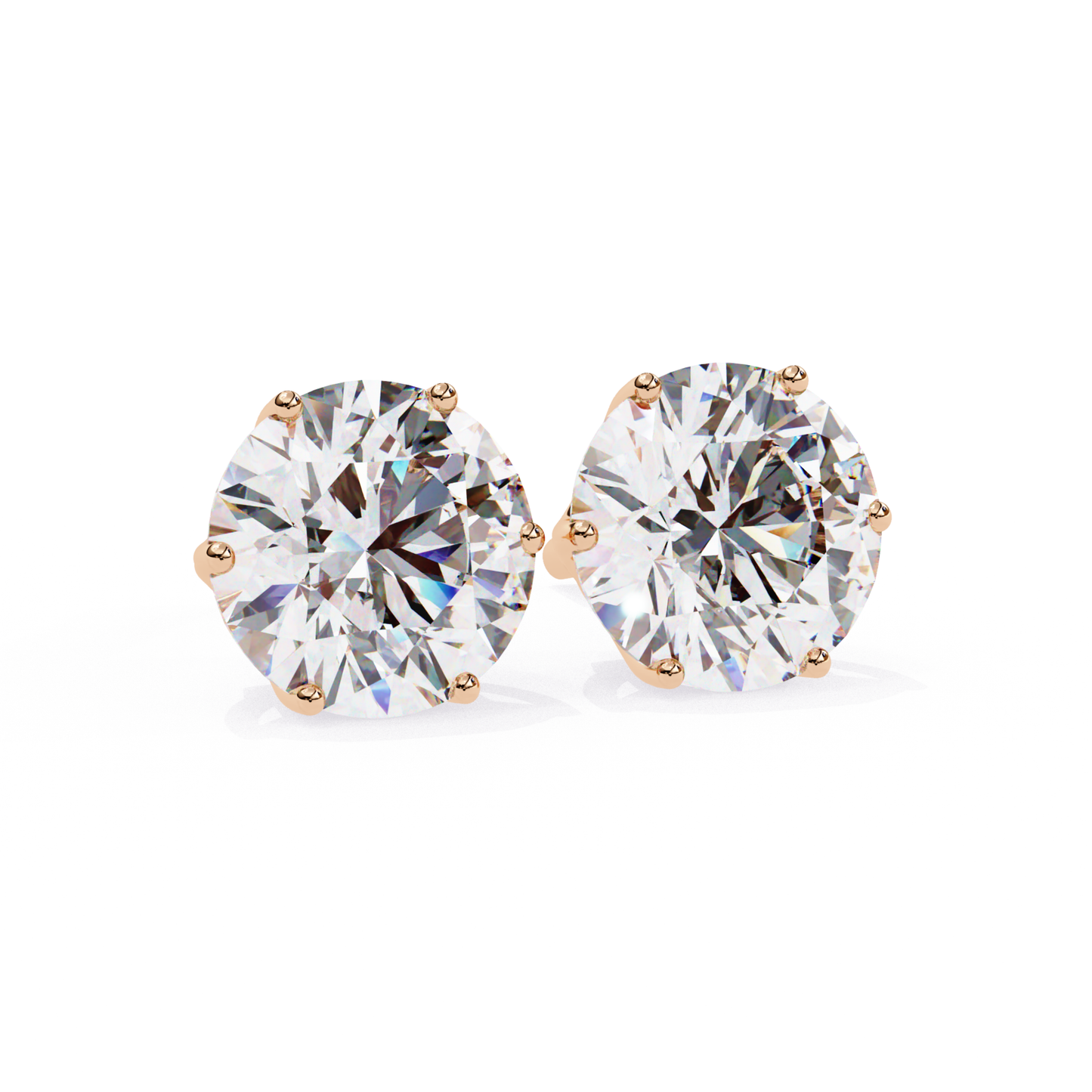 Pair of round diamond stud earrings in a six-prong white gold setting
