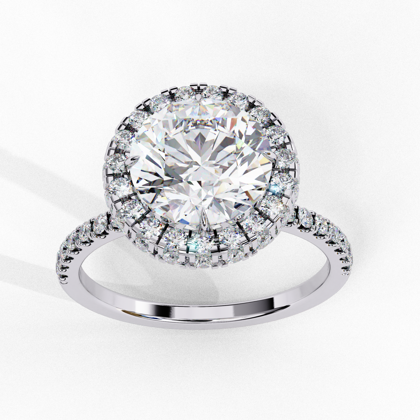 Round diamond with halo and pave band
Diamond halo ring with a round center stone
Elegant halo design with a round diamond
Pave band diamond ring with a halo setting
Round diamond encircled by a Shining halo
Halo engagement ring with round diamond
Diamond halo ring on a pave band
Round diamond surrounded by a halo setting
Halo ring with round diamond and pave details
Classic round diamond halo ring with pave accents