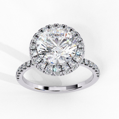 Round diamond with halo and pave band
Diamond halo ring with a round center stone
Elegant halo design with a round diamond
Pave band diamond ring with a halo setting
Round diamond encircled by a Shining halo
Halo engagement ring with round diamond
Diamond halo ring on a pave band
Round diamond surrounded by a halo setting
Halo ring with round diamond and pave details
Classic round diamond halo ring with pave accents