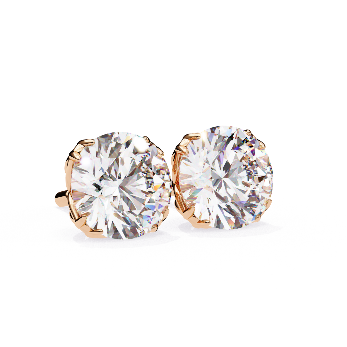 Pair of diamond stud earrings with rose gold settings on a white background