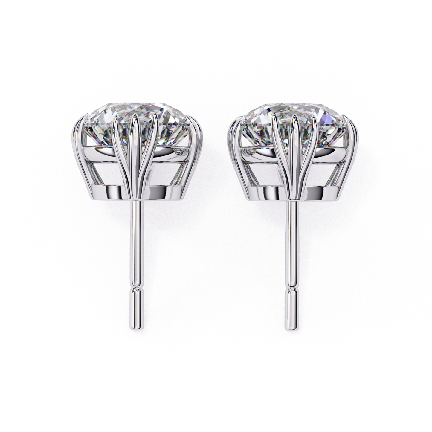 Elegant white gold diamond earrings with a crown setting, highlighting the brilliance of the diamonds set in a secure, timeless design.
