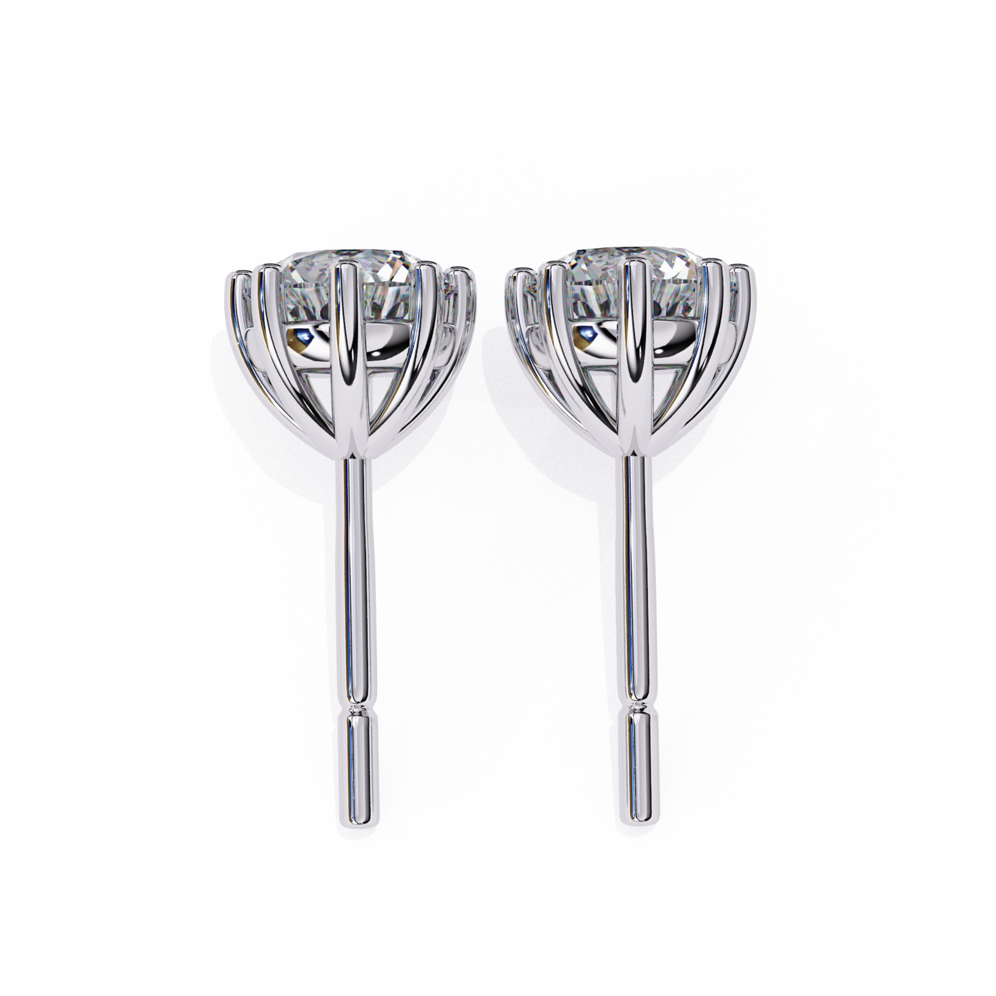 Elegant white gold solitaire diamond studs, a classic addition to your jewelry collection.