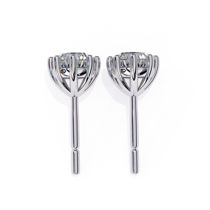 Elegant white gold solitaire diamond studs, a classic addition to your jewelry collection.