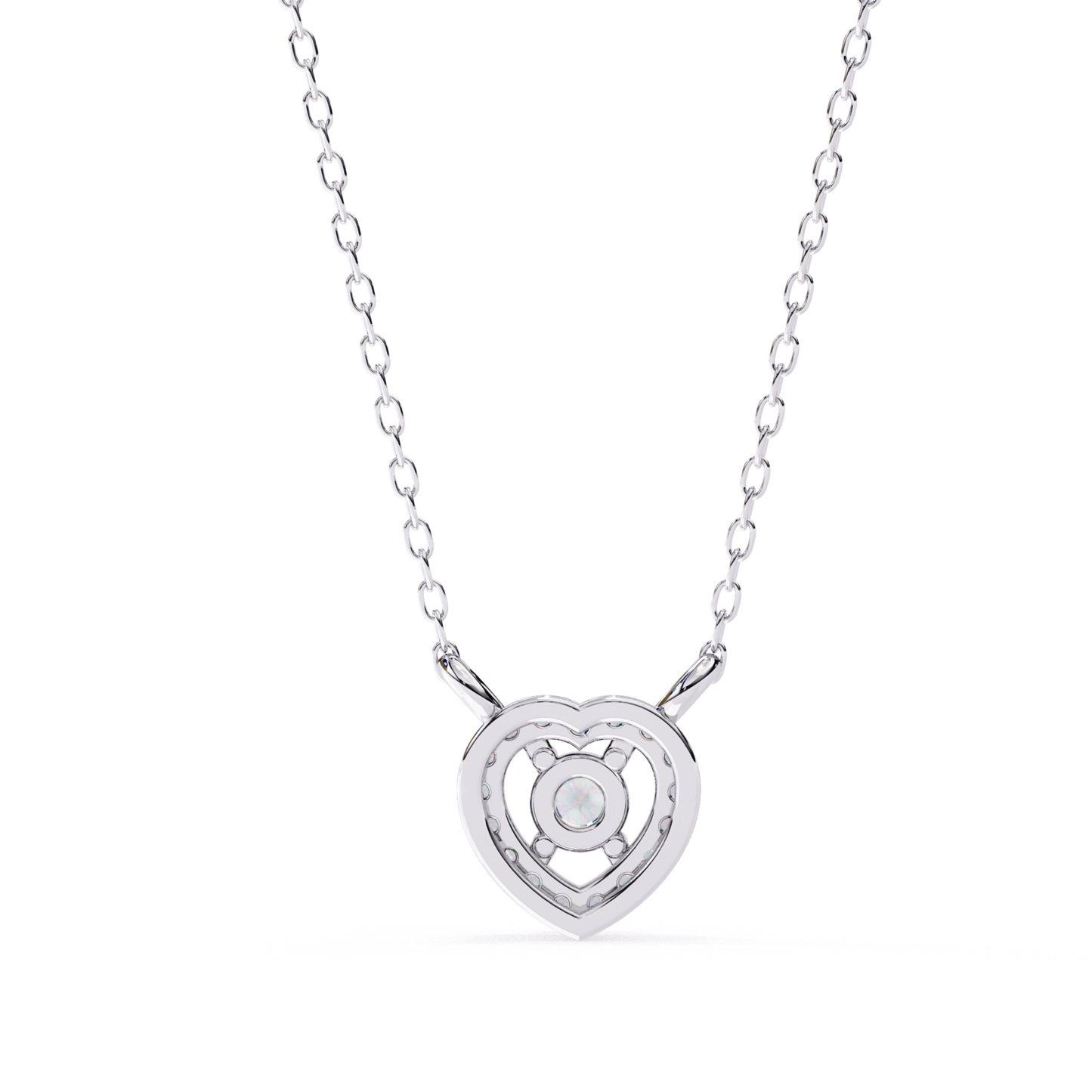 Back side view of a white gold heart necklace pendant showing the setting structure.