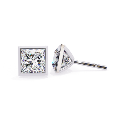 Elegant white gold stud earrings with a brilliant princess-cut diamond at the center, framed by a square setting for a refined and sparkling appearance.