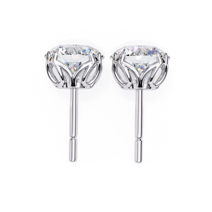 White gold round diamond stud earring showing basket setting