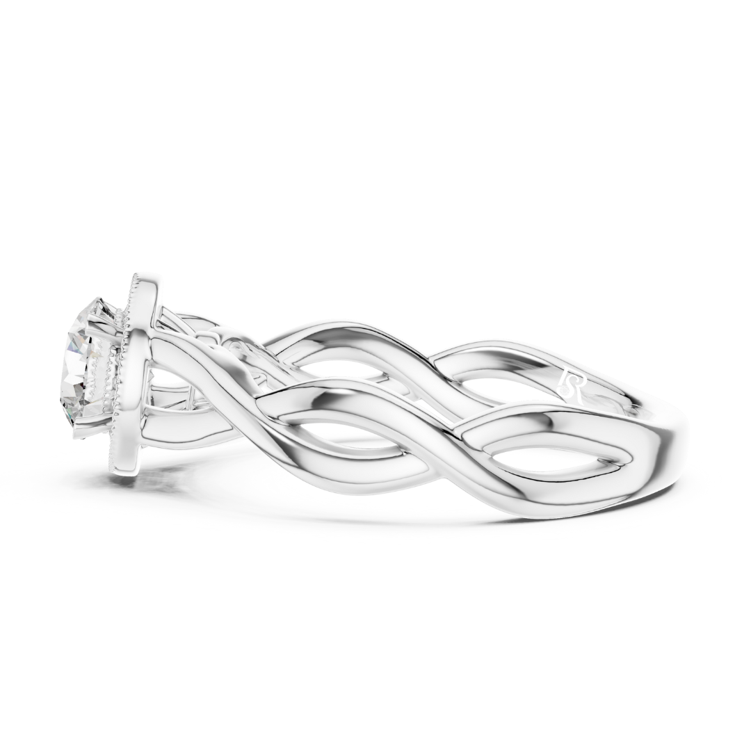 White gold braided band diamond ring side view
Braided white gold ring with round diamond setting
Side profile white gold halo diamond ring
White gold twisted band ring with center diamond
Braided design white gold diamond ring close view
White gold ring with woven band detail
Round diamond halo ring in white gold band
White gold braided ring showing side angle
Elegant white gold diamond ring band detail
White gold halo diamond ring side design