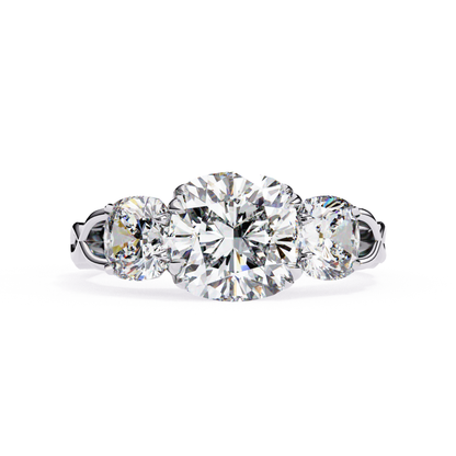 White gold cushion diamond ring
Cushion diamond trio ring
White gold cushion center stone
Cushion diamond ring front view
White gold three diamond ring
Cushion cut diamond ring style
White gold cushion diamond band
Cushion diamond ring close view
White gold diamond ring detail
Cushion diamond trio design