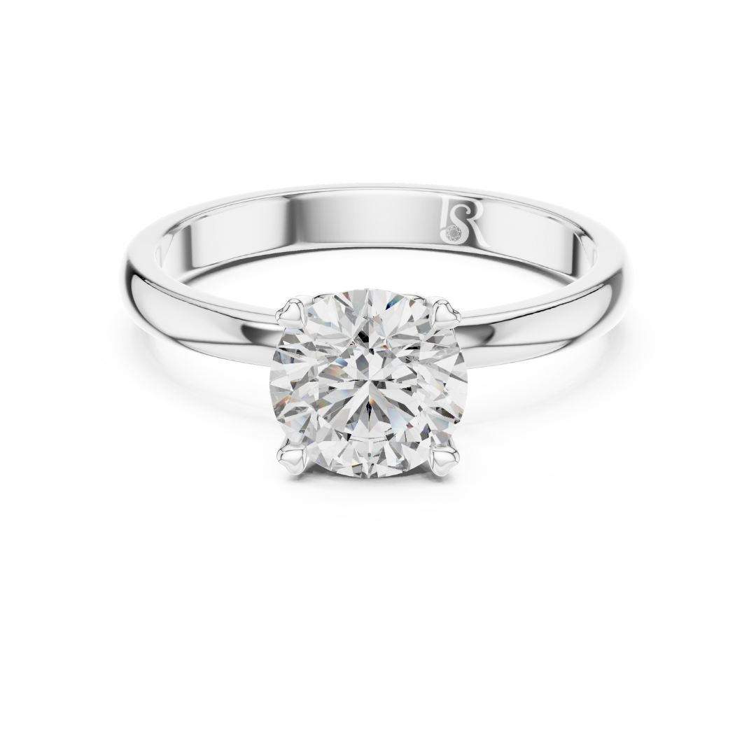 White gold diamond solitaire ring front view
White gold round diamond ring center view
White gold solitaire diamond ring close view
White gold diamond ring prong setting
White gold round diamond solitaire front
White gold diamond ring simple band
White gold solitaire ring clean look
White gold diamond ring smooth finish
White gold round diamond ring detail
White gold solitaire diamond ring view