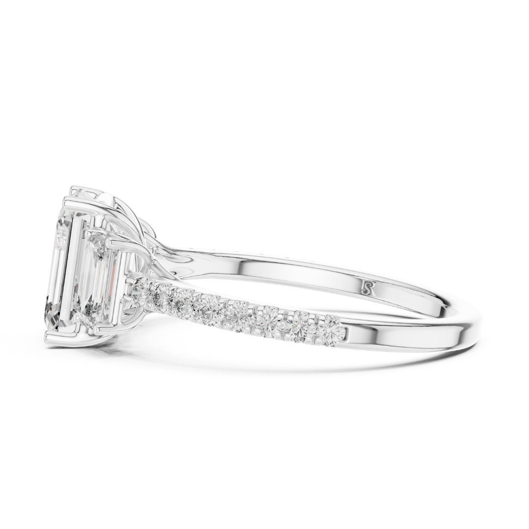 Profile view of emerald cut three stone diamond ring in white gold
White gold emerald diamond ring with pave band profile view
Emerald cut diamond engagement ring side profile in white gold
Three stone emerald diamond ring profile angle
White gold ring with emerald cut side stones profile view
Emerald cut lab diamond ring with pave band side angle
Minimal white gold emerald diamond ring profile view
Pave band three stone diamond ring in white gold
Classic emerald cut engagement ring profile view
White gold 