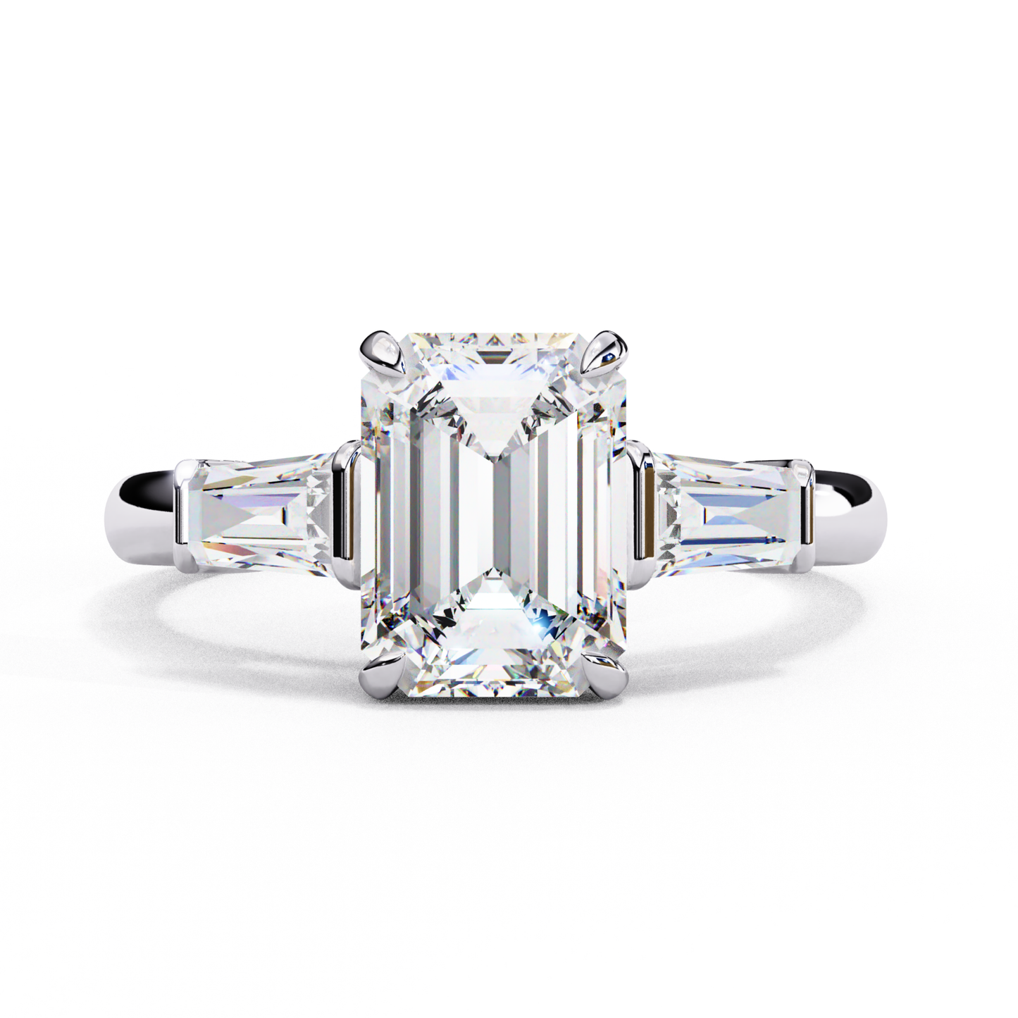 White gold band with emerald diamonds
Three emerald diamonds in white gold
White gold ring with emerald cut stones
Trio emerald cut ring in white gold
Close up of white gold emerald ring
Elegant white gold trio ring
Side view of white gold emerald ring
White gold band with three diamonds
Three emerald cut diamonds in white gold
Top view of white gold trio ring