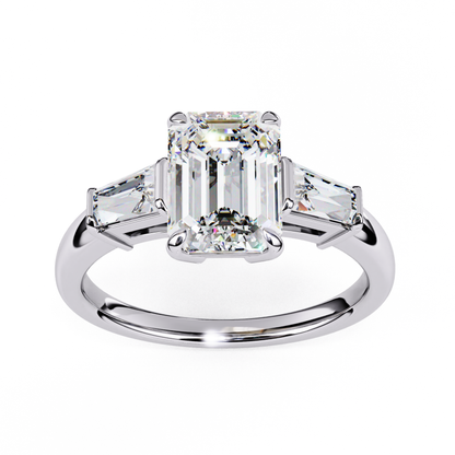 White gold band with three emerald diamonds
Three emerald cut diamonds in white gold
White gold ring with emerald cut diamonds
Trio emerald cut diamond ring in white gold
Close up of white gold ring with emerald diamonds
Elegant white gold trio ring
Side view of white gold trio ring
White gold band with emerald stones
Three emerald diamonds in white gold
Top view of white gold emerald ring