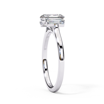 White gold band with emerald diamond
Emerald diamond in white gold
White gold ring with emerald stone
Side view of white gold ring
Simple white gold band with emerald
White gold ring with emerald cut gem
Top view of white gold emerald ring
Slim white gold ring with emerald
White gold solitaire with emerald diamond
Elegant white gold emerald ring