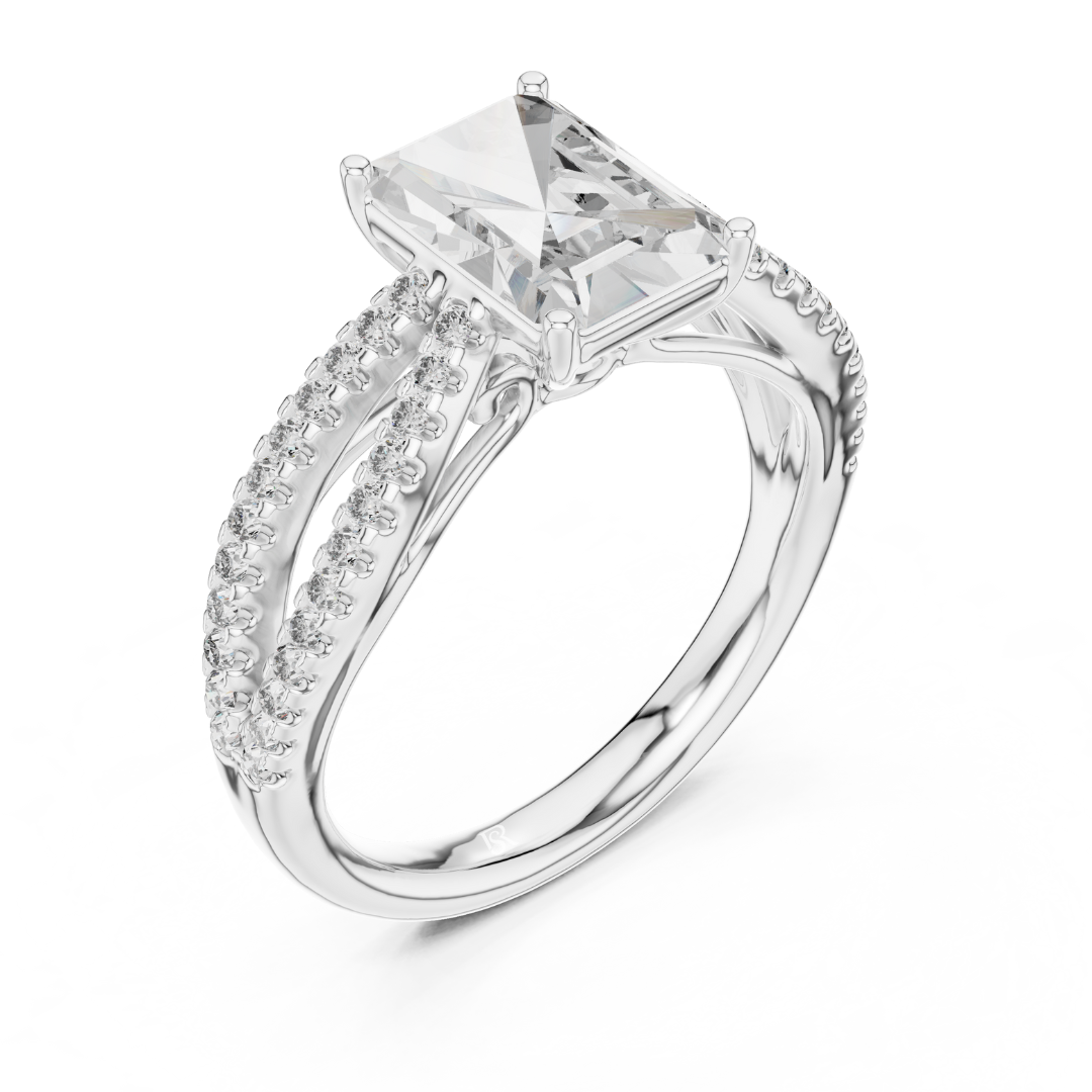 Angled side view radiant cut diamond ring in white gold
White gold radiant diamond ring with split pave shank
Radiant cut diamond engagement ring angled side profile
White gold radiant center stone ring with pave band
Side angle radiant diamond bridal ring in white gold
White gold radiant diamond ring with double split shank
Elegant radiant cut ring with pave diamond detailing
Angled profile radiant diamond ring with polished white gold band
Luxury white gold radiant cut diamond engagement ring
White gold r