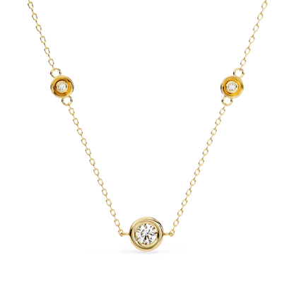 Yellow gold station necklace with round bezel diamonds
