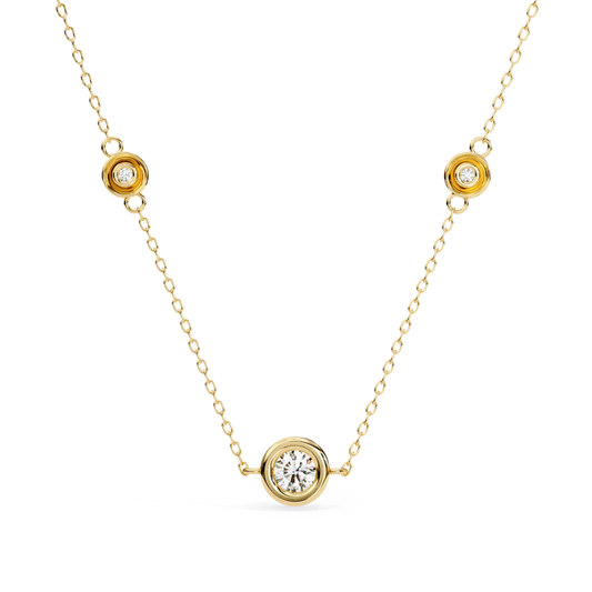 Yellow gold station necklace with round bezel diamonds