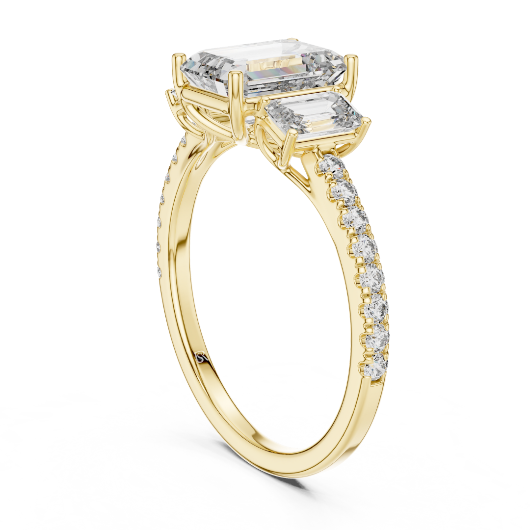 Back view of emerald cut three stone diamond ring in yellow gold
Yellow gold emerald diamond ring with pave band back angle
Emerald cut diamond engagement ring rear profile
Three stone emerald diamond ring back view in yellow gold
Yellow gold ring with emerald cut diamonds rear view
Emerald cut lab diamond ring with pave band back profile
Minimal yellow gold emerald diamond ring back angle
Rear view of three stone diamond ring with pave band
Classic emerald cut engagement ring in yellow gold back view
Yello