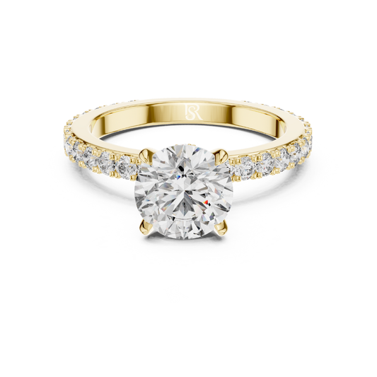 Yellow gold round diamond solitaire engagement ring
Round cut diamond ring with pave band
Yellow gold solitaire ring front view
Classic round diamond engagement ring in gold
Pave diamond band with round center stone
Minimalist yellow gold diamond solitaire ring
Round brilliant diamond ring with slim band
Yellow gold prong set diamond engagement ring
Elegant solitaire diamond ring with pave accents
Round diamond engagement ring close up front view