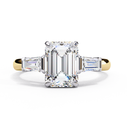 Yellow gold band with three emerald diamonds
Three emerald cut diamonds in yellow gold
Yellow gold ring with three emerald diamonds
Three stone emerald cut ring in yellow gold
Close up of yellow gold ring with diamonds
Elegant yellow gold three stone ring
Side view of yellow gold ring with emeralds
Yellow gold band with three emerald stones
Three emerald diamonds in yellow gold
Top view of yellow gold emerald ring