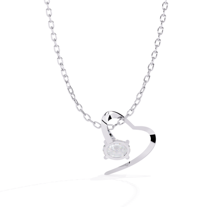 Silver necklace with a heart-shaped pendant on a white background