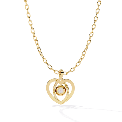 yellow gold heart pendant showing rear setting with open back design and circular stone mount