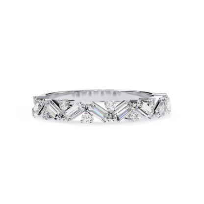 Top view of a white gold band featuring baguette diamonds arranged in a zigzag pattern