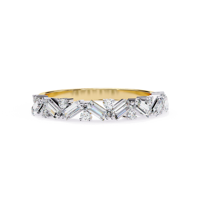 Top view of a yellow gold band with baguette cut diamonds and round diamond accents